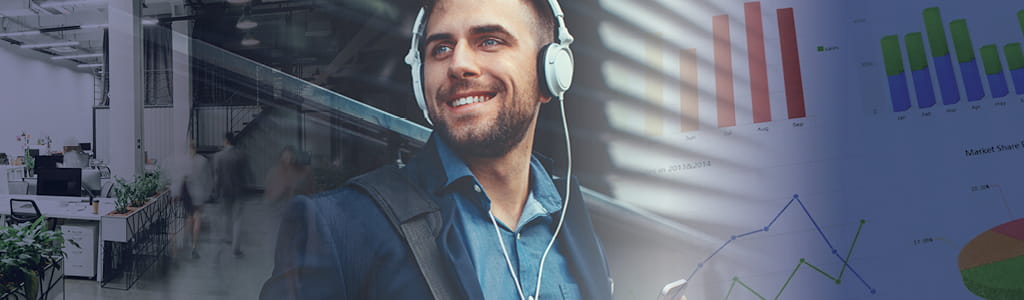 Man in office with earbuds