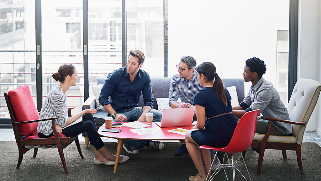 Employees engaged in active discussion