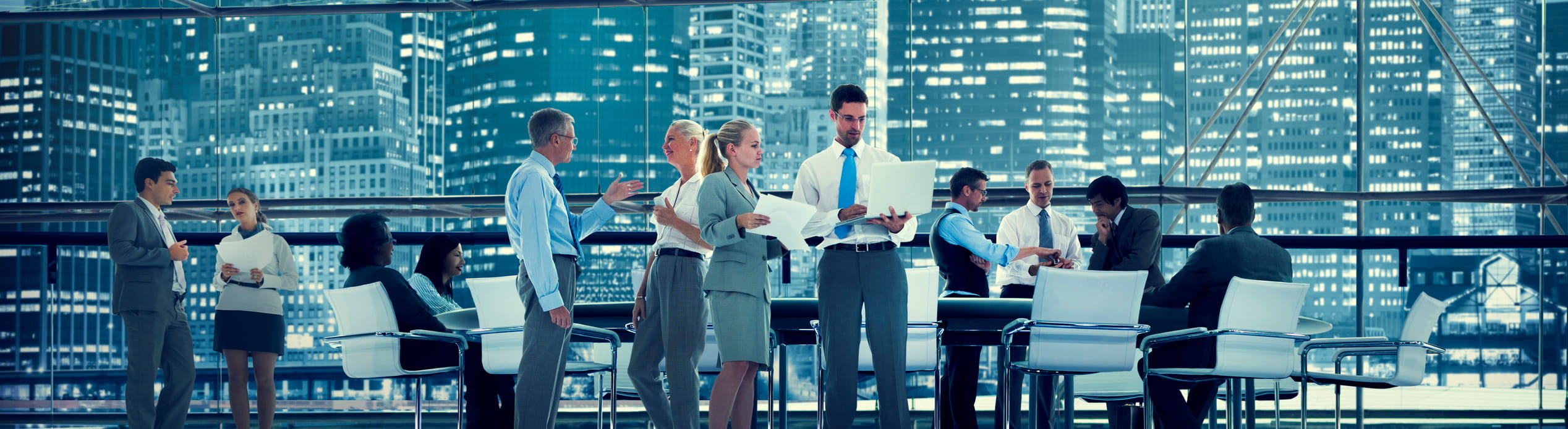 Business people in front of a cityscape