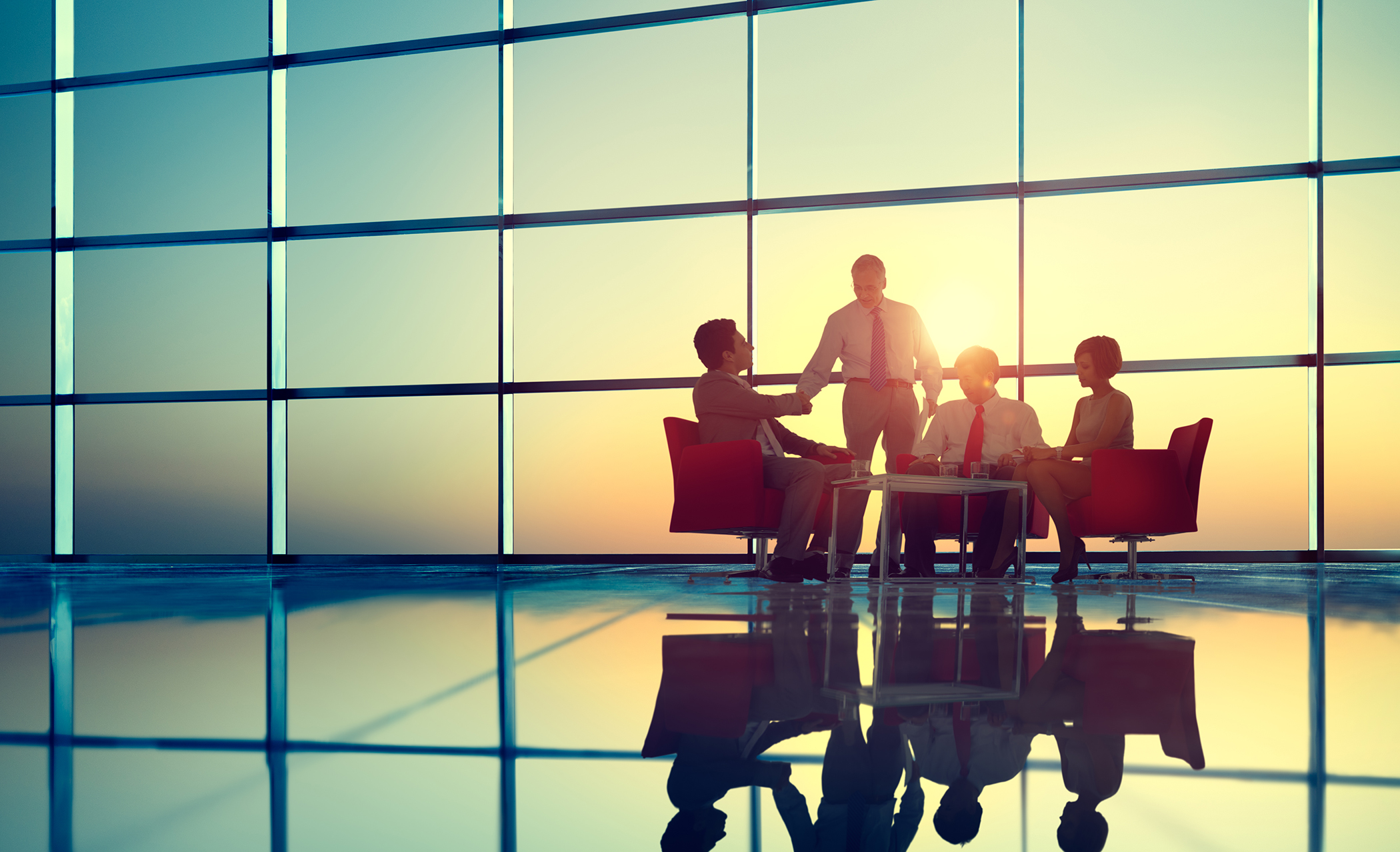 Office discussion in front of a window