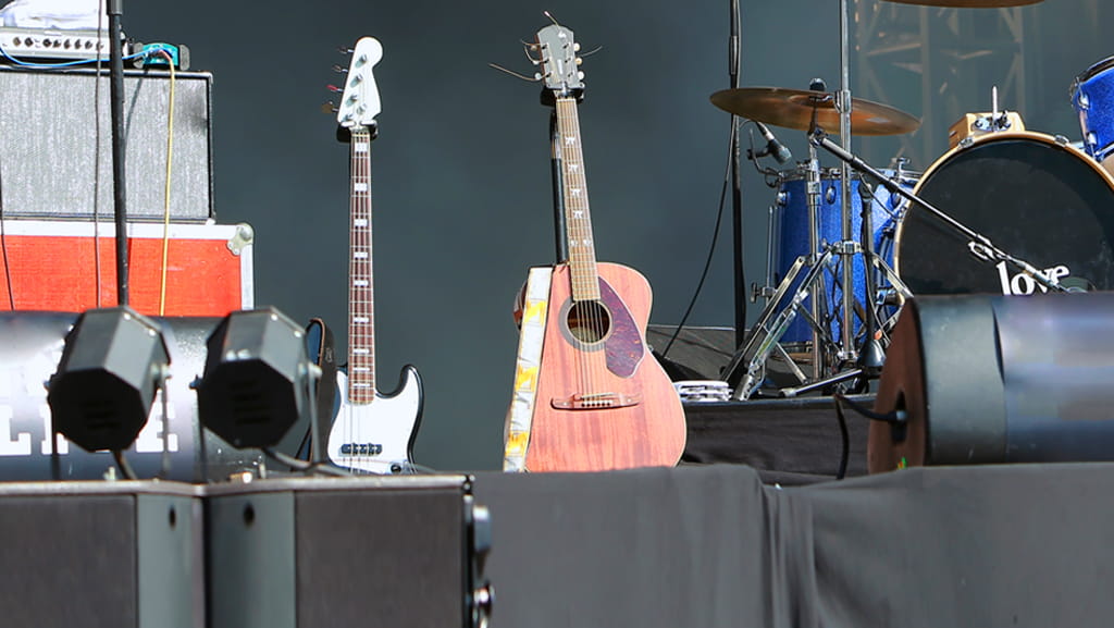 Guitars set up on a stage