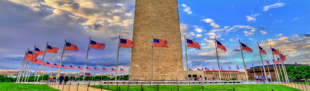 american flags in front of lincoln monument