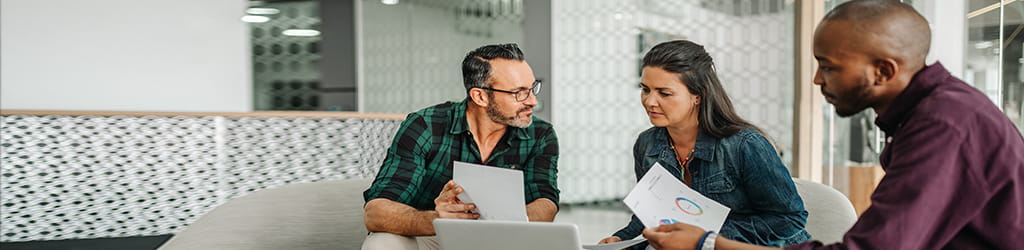 colleagues discussing documents