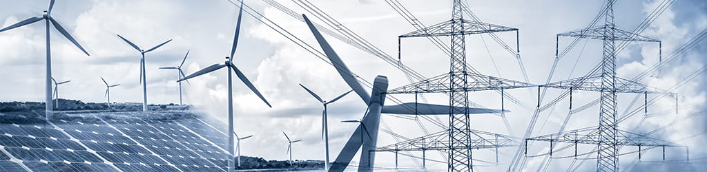 Windmills and solar panels illustrating renewable energy