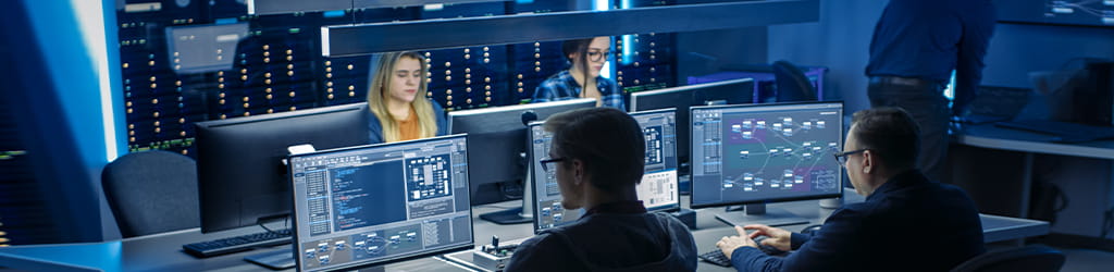 technology workers working on computers