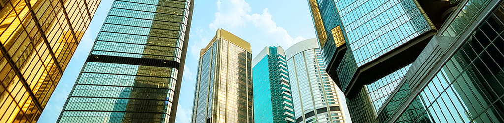 press release banner with high rise buildings