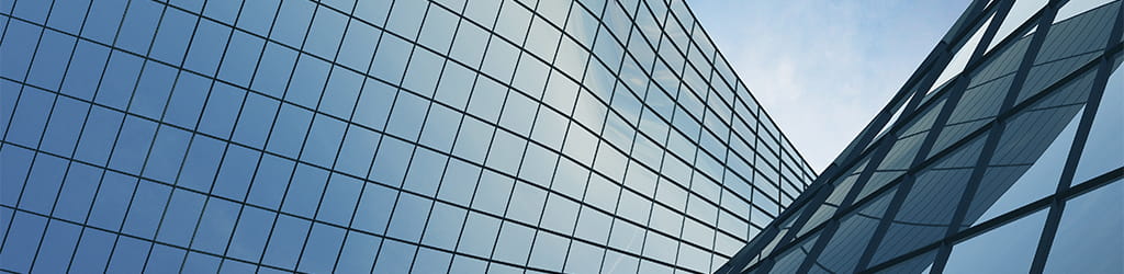 glass windows on a building in blue