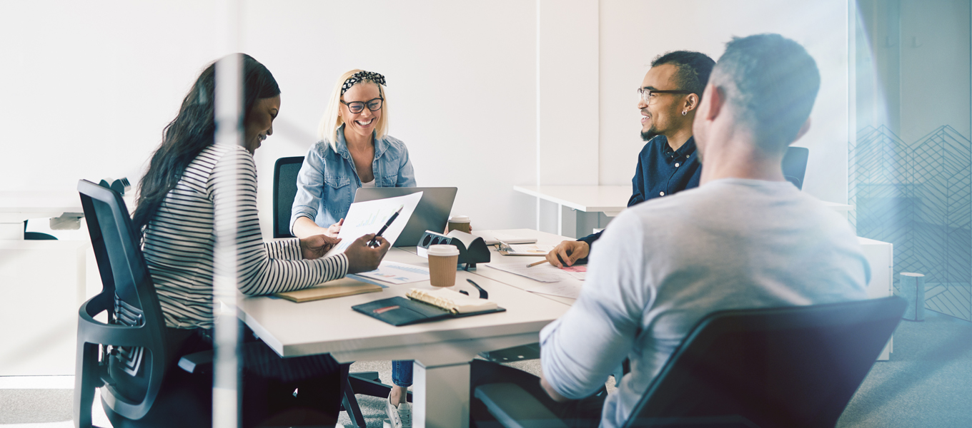a team working around a table