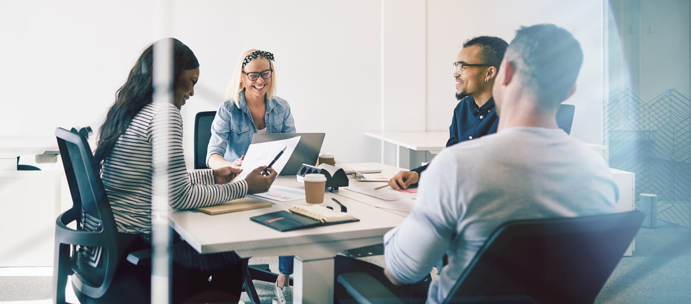 a team working around a table