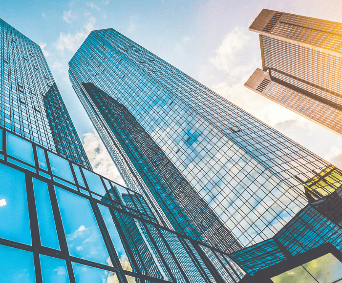 skyscrapers reflecting blue and orange light
