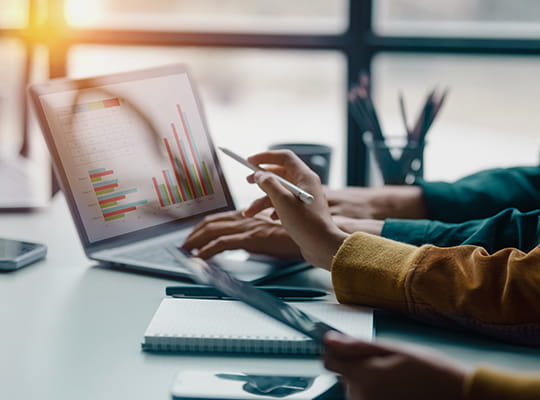 a team in a glass conference room