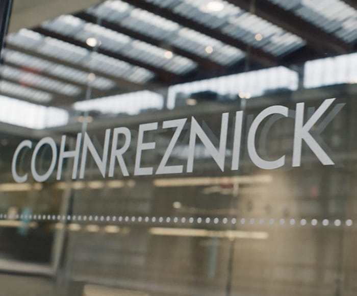 cohnreznick logo on the office wall