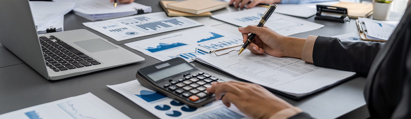 a woman working with a calculator