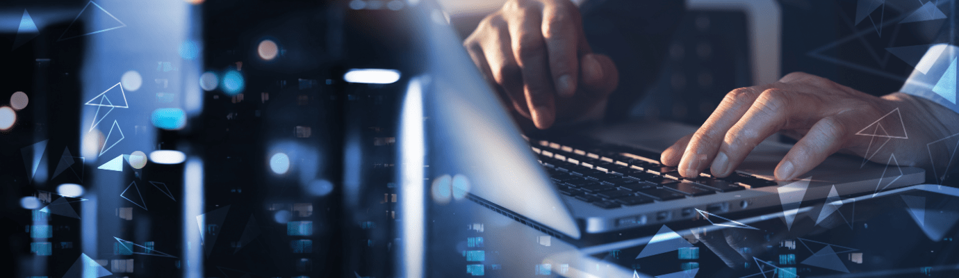 typing on a laptop computer