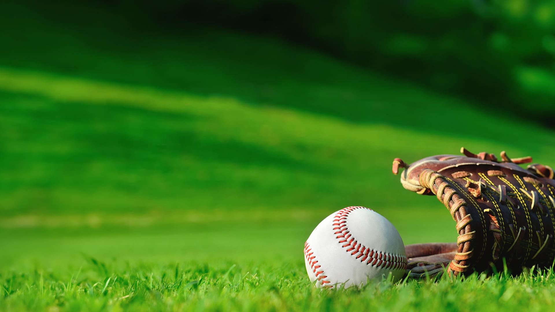 baseball on green field
