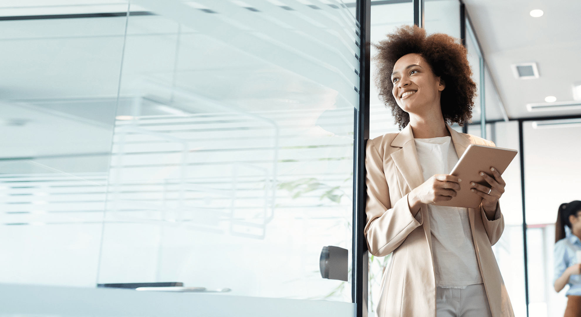 a woman working in a hallway mainsurance-hero-banner