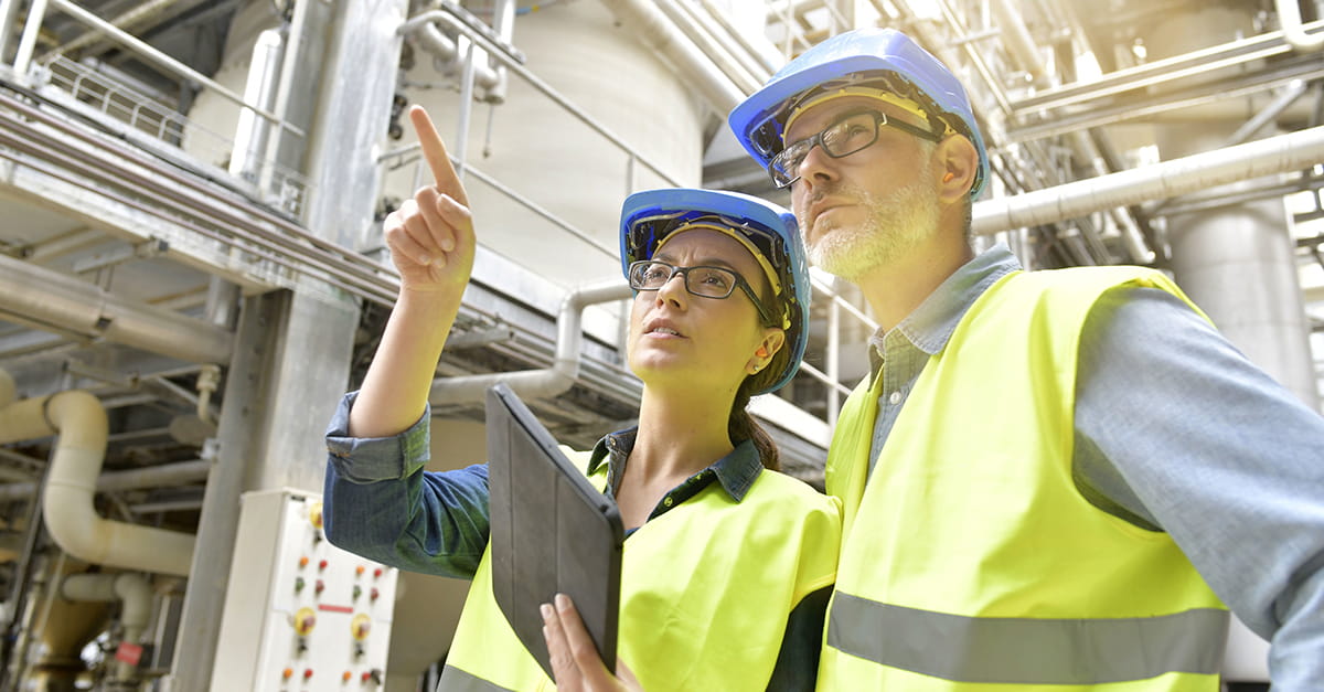 two employees in manufacturing setting