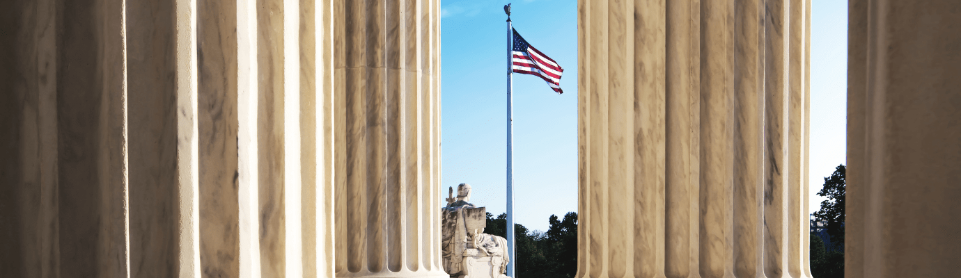 american flag at a government building