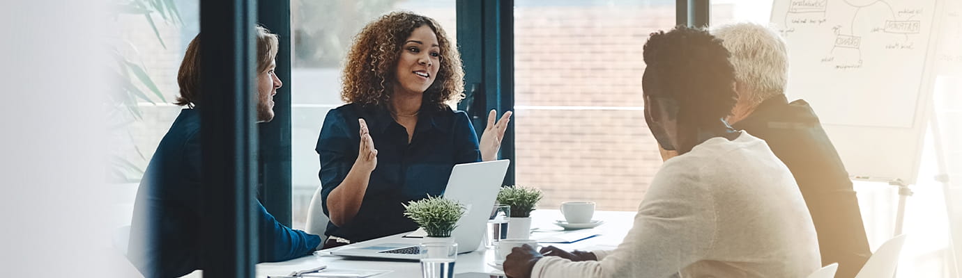 a conference room meeting with coworkers