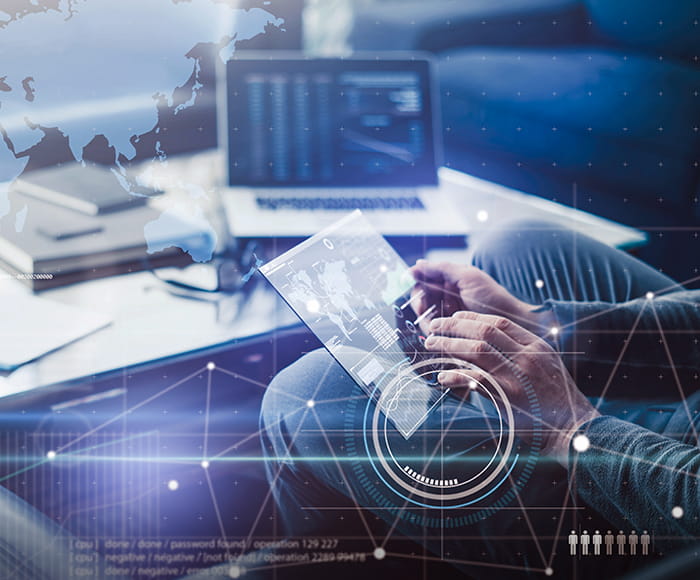 laptop and screens showing risk advisory illustration