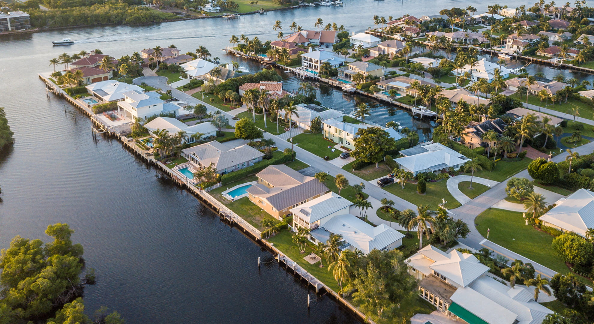 a series of home on a body of water