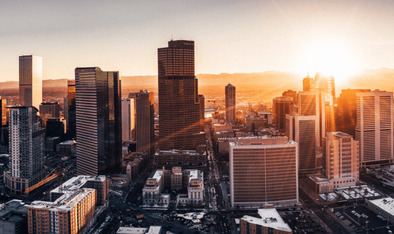 a city skyline during sunset