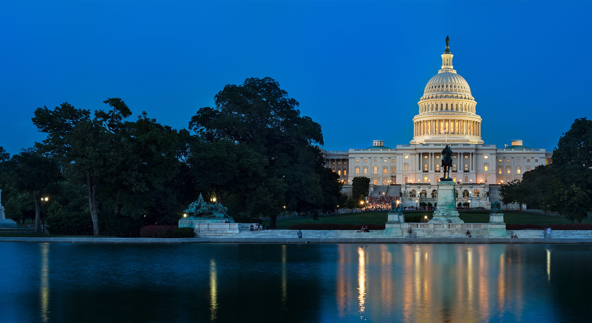 a government building at night from a far