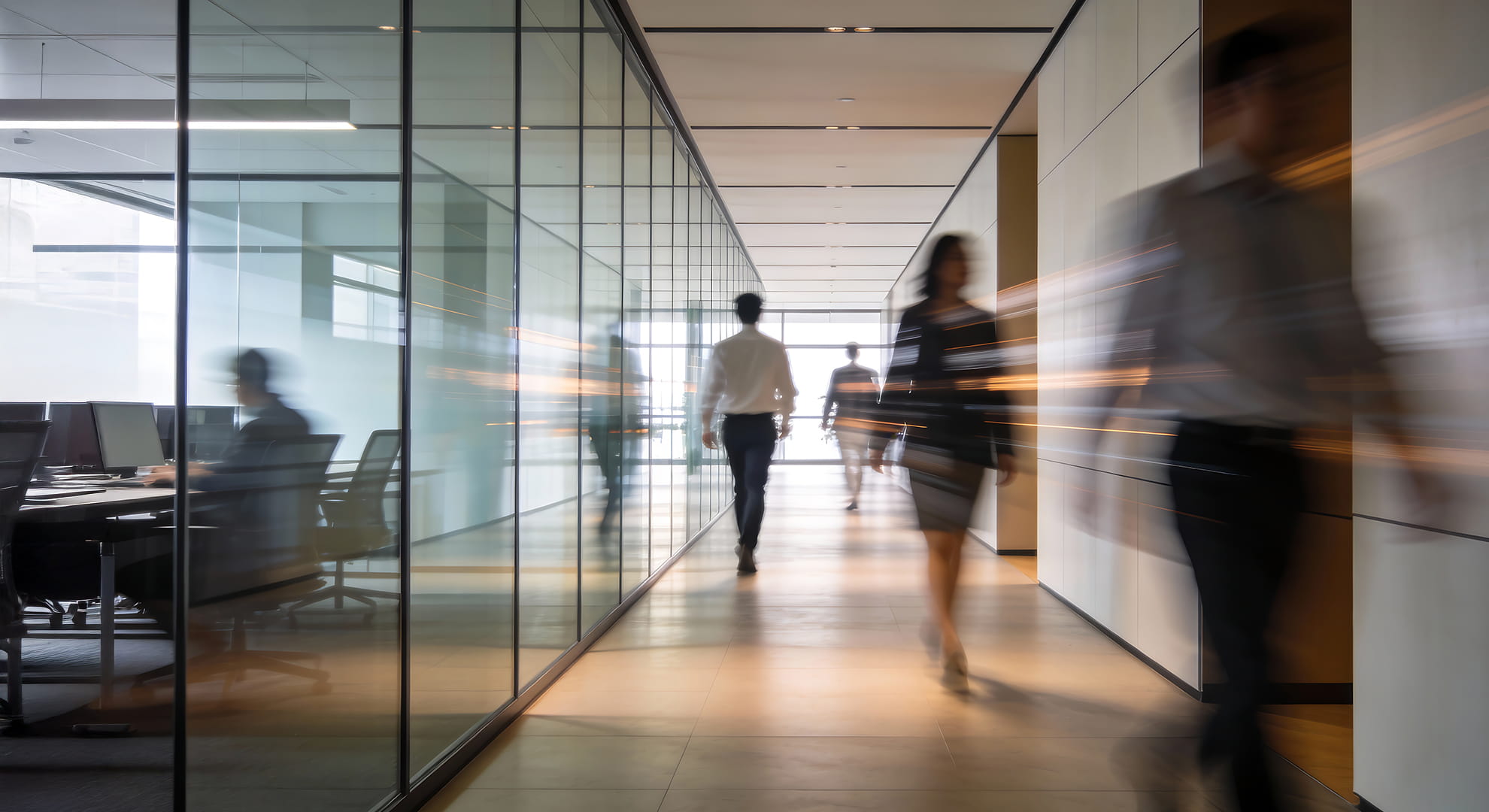 people walking fast across a room